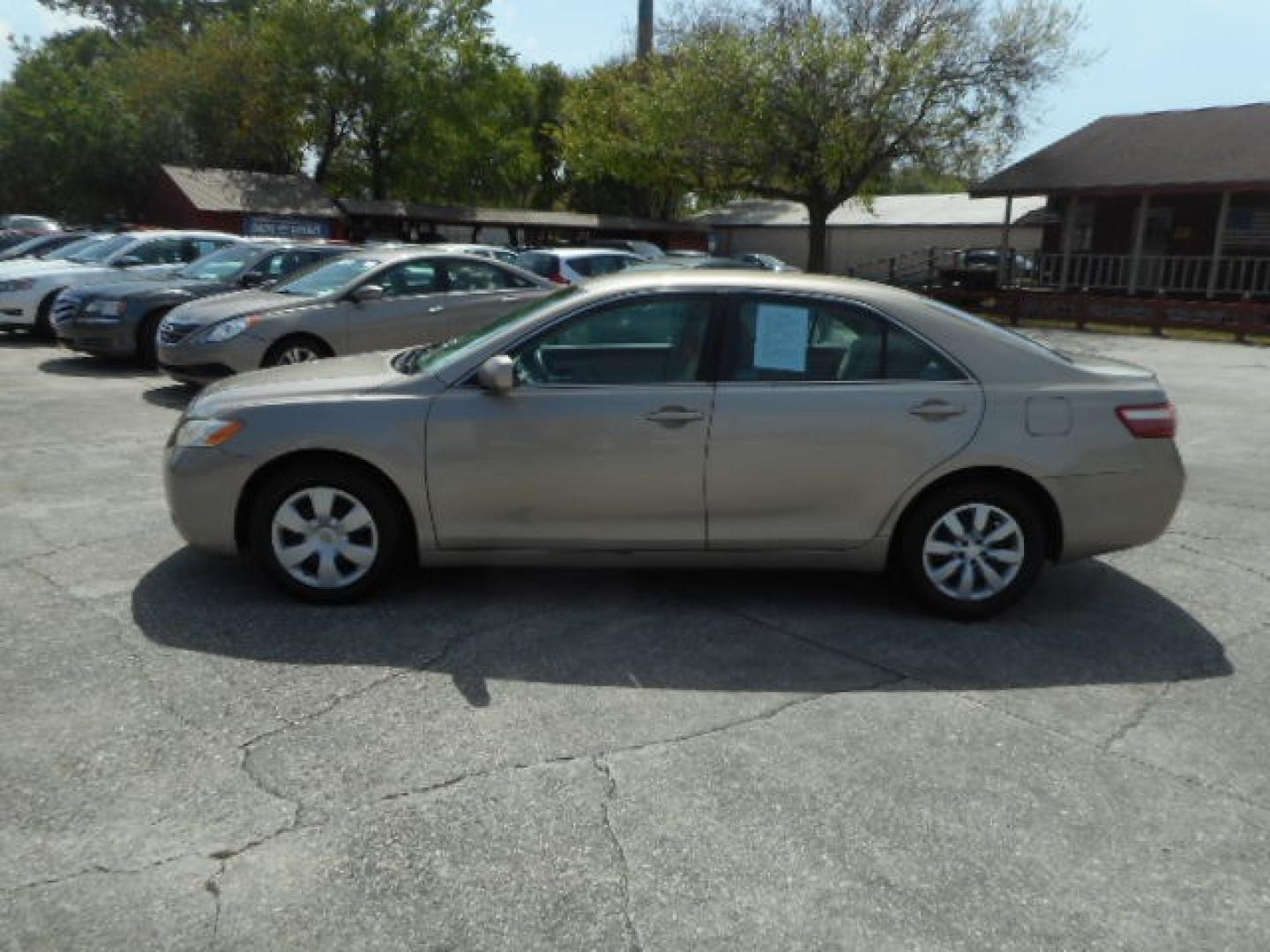 2009 GOLD TOYOTA CAMRY CE; SE; LE; XL (4T1BE46K29U) , located at 10405 Abercorn Street, Savannah, GA, 31419, (912) 921-8965, 31.988262, -81.131760 - Photo#1